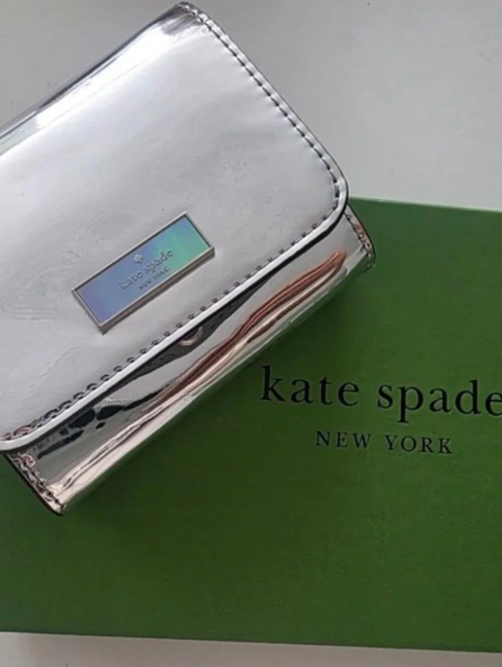 kate spade Silver Metallic Compact Card Wallet with Iridescent Logo Plaque